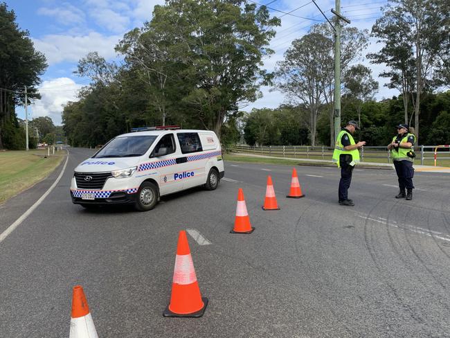 Connection Rd at Mooloolah Valley was closed after a serious crash involving two cars and a motorbike. Picture: Patrick Woods