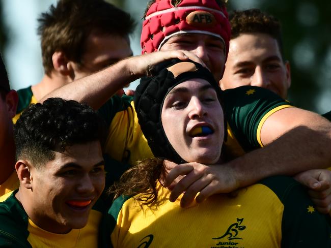 SANTA FE, ARGENTINA - JUNE 04: Lachlan Lonergan of Australia U20 celebrates with his teammates after scoring a try during a first round match between Australia U20 and Italy U20 as part of World Rugby U20 Championship 2019 at Club de Rugby Ateneo Inmaculada on June 4, 2019 in Santa Fe, Argentina. (Photo by Amilcar Orfali/Getty Images)