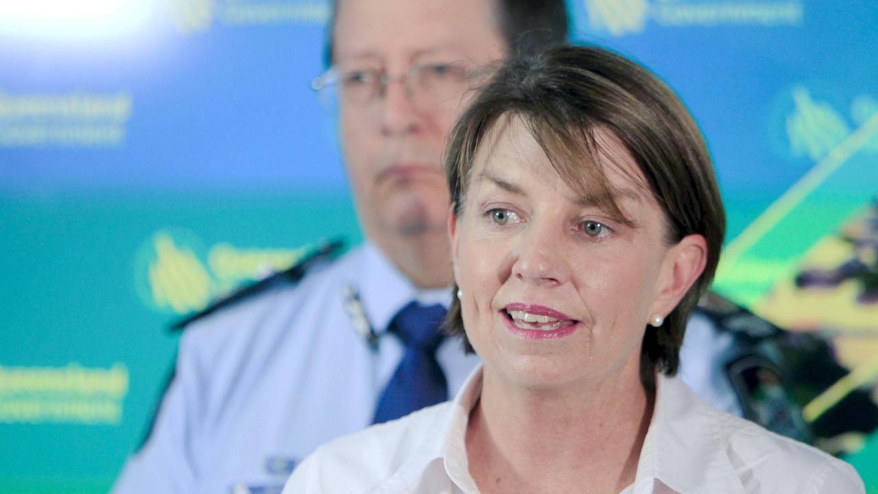 Then Queensland premier Anna Bligh addresses media as Deputy Police Commissioner Ian Stewart looks on. Ms Bligh said after the speech she felt she had failed. Picture: AAP/Glenn Hunt