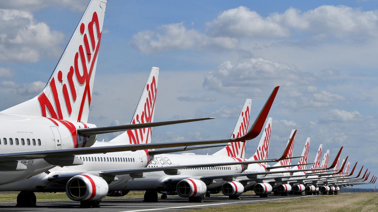 Grounded Virgin aircraft parked at Brisbane Airport. Picture: Darren England/AAP