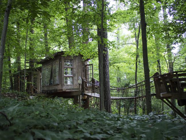 This treehouse has three separate rooms joined by rope bridges. Picture: Airbnb