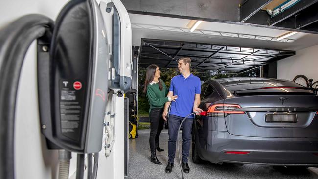 Clinton and Rosie Waters love their Tesla and the ease with which it charges. Picture: Tim Carrafa