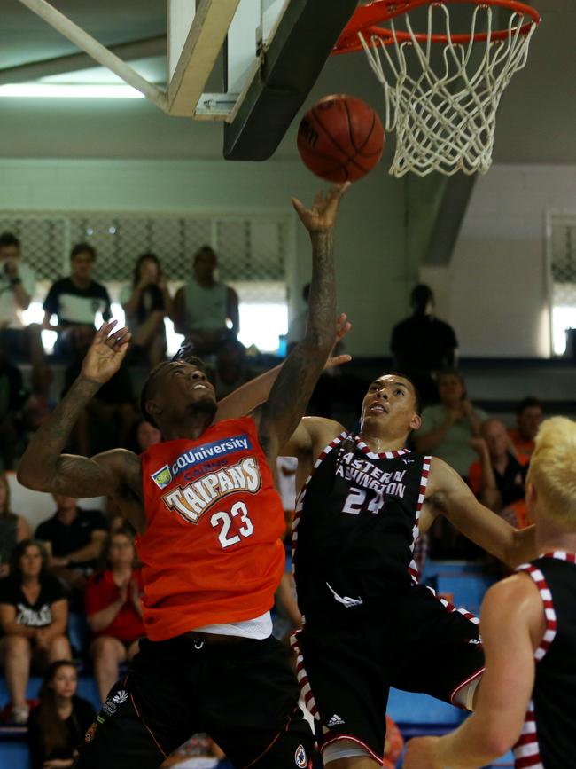 Jacob Wiley, right, playing for East Washington State University against Cairns Taipans in 2016. Picture: Stewart McLean