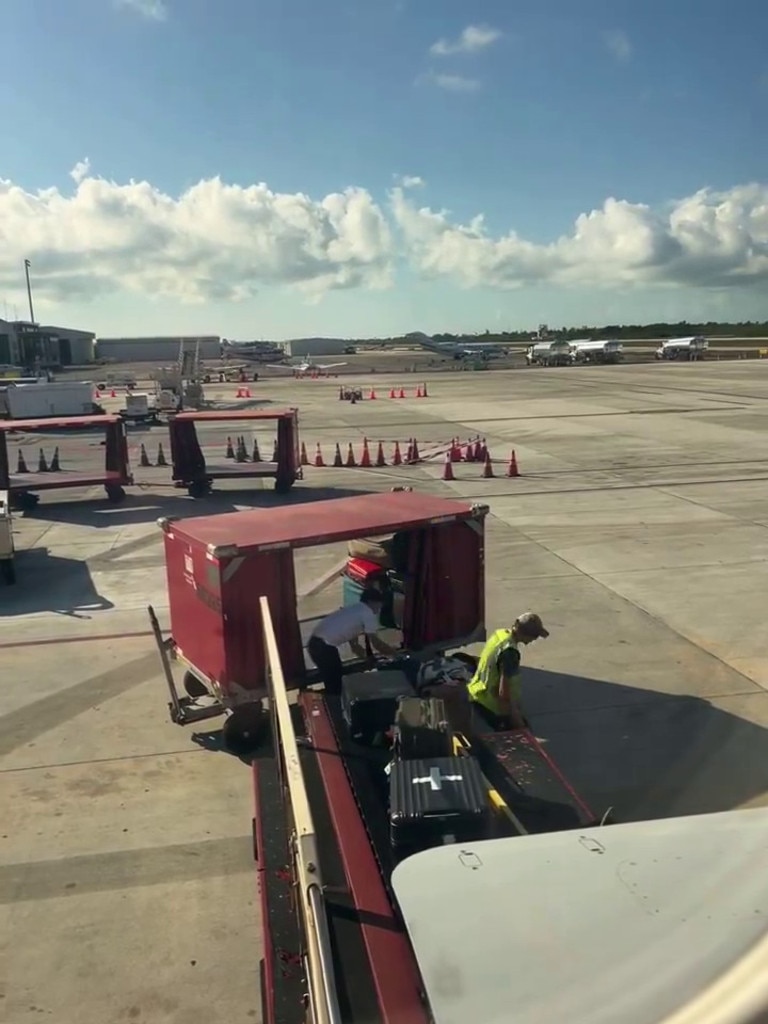 Stepping out of the cockpit at Key West International Airport, the pilot assisted the crew in loading luggage onto the plane. Picture: @robertidellxyz