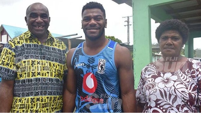 Maika Sivo with parents Joeli Nawalu and mother Mere Nawalu Christmas day at his village of Momi, in the province of Nadroga. few kilometers from Nadi town.Picture: Fiji Sun/Waisea Nasokia