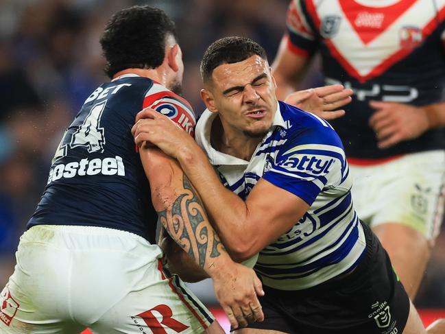 SYDNEY, AUSTRALIA - MAY 16: Jacob Kiraz of the Bulldogs is tackled during the round eleven NRL match between Bulldogs and Roosters at Accor Stadium, on May 16, 2025, in Sydney, Australia. (Photo by Mark Evans/Getty Images)