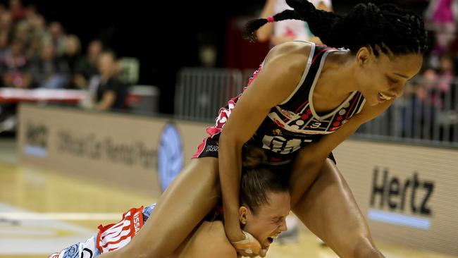 Shamera Sterling of the Thunderbirds clashes with Paige Hadley of the Swifts. Picture: AAP.