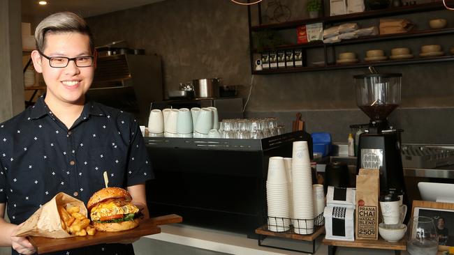 Chef Angus Chen serves the ramly burger at Gardenia Cafe. Picture: Hamish Blair