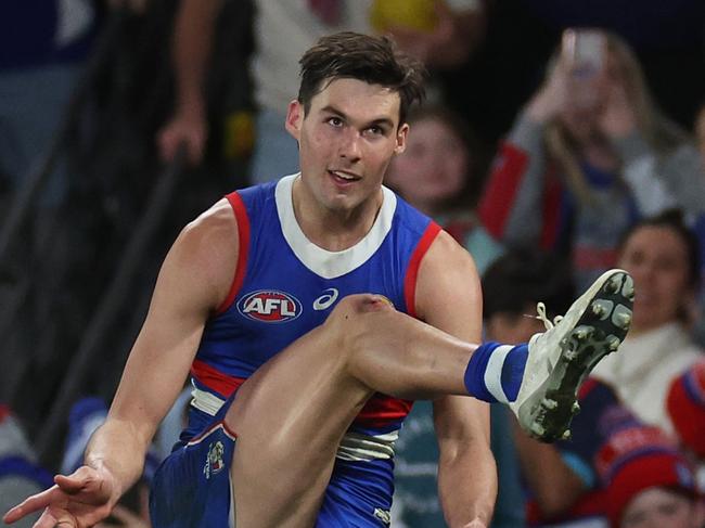 MELBOURNE, AUSTRALIA - AUGUST 18: Sam Darcy of the Bulldogs kicks for goal during the round 23 AFL match between Western Bulldogs and North Melbourne Kangaroos at Marvel Stadium, on August 18, 2024, in Melbourne, Australia. (Photo by Daniel Pockett/Getty Images)