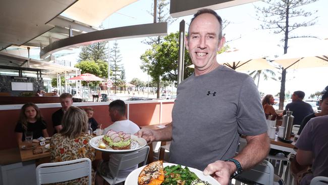 Owner Dean Saul of Vanilla Lily Espresso on Marine Parade, Coolangatta. Photograph: Jason O'Brien