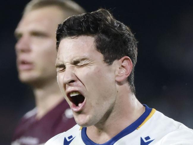 SUNSHINE COAST, AUSTRALIA - AUGUST 14: Mitchell Moses of the Eels reacts after fumbling the ball during the round 22 NRL match between the Manly Sea Eagles and the Parramatta Eels at Sunshine Coast Stadium, on August 14, 2021, in Sunshine Coast, Australia. (Photo by Glenn Hunt/Getty Images)