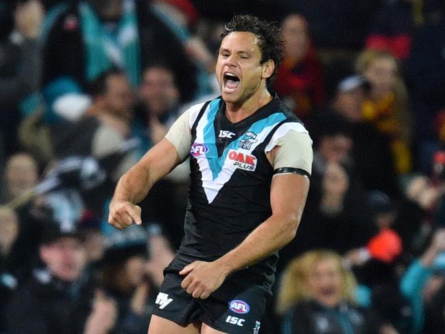 Steven Motlop of the Power celebrates after kicking the winning goal during the Round 8 AFL match between the Port Adelaide Power and the Adelaide Crows at Adelaide Oval in Adelaide, Saturday, May 12, 2018. (AAP Image/David Mariuz) NO ARCHIVING, EDITORIAL USE ONLY