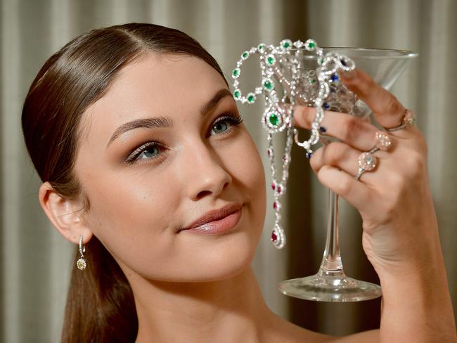 Tiyannah (Finesse Models) with some of the natural coloured diamond rings and natural stone jewellery from Michael Hill, Rundle Mall. The diamond rings alone have a combined value of $465,000.picture: Bianca De Marchi