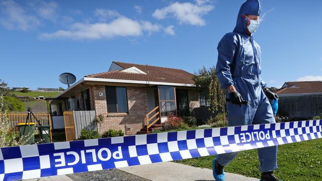 Police examining the unit of missing man Noel Joseph Ingham, 58, at West Ulverstone last month.