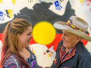 HAPPY CHAT: Nadine Sedger from TAFE Community Services course talks with Gumbaynggir elder John Marshall at last year's Gurehlgam Reconciliation Week event. Picture: Adam Hourigan