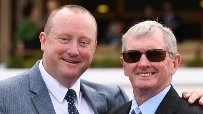 Trainers Wayne Hawkes and John Hawkes pose after Wild Planet won race 5, the Furphy Ale March Stakes, during Super Saturday at Flemington Racecourse in Melbourne, Saturday, March 7, 2020. (AAP Image/Vince Caligiuri) NO ARCHIVING, EDITORIAL USE ONLY