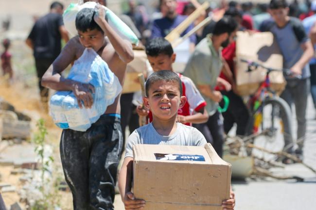 Aid centres in hunger-wracked Gaza were temporarily closed on Wednesday