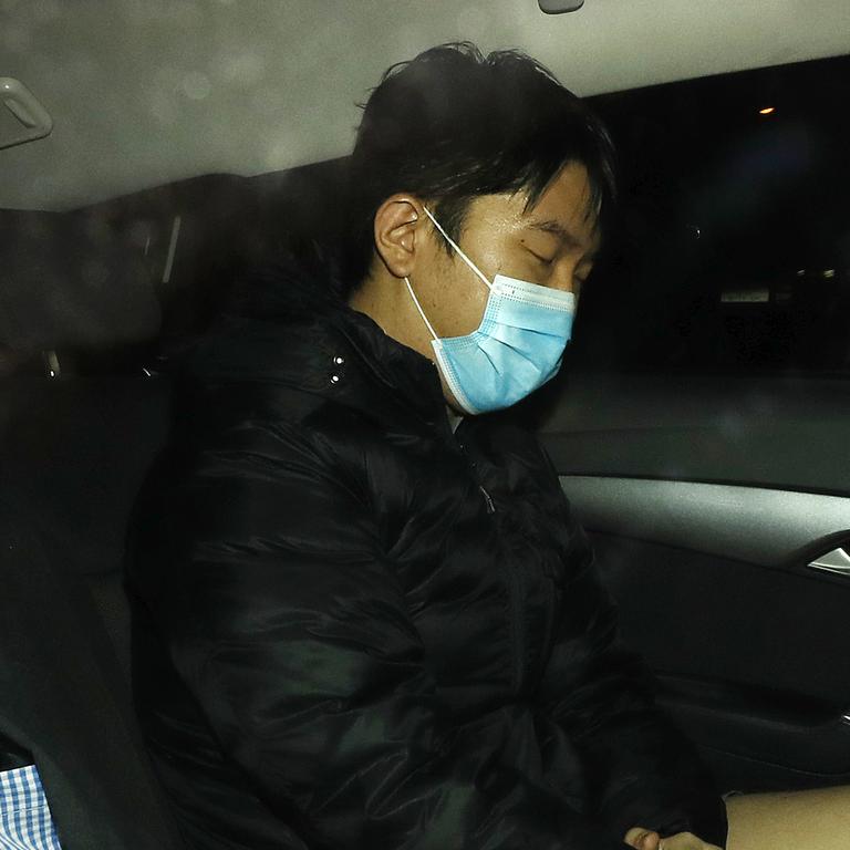 Yang Zhao pictured entering the Brisbane Watch House after being extradited from Sydney over the alleged murder of Qiong Yan, Brisbane 22nd of July 2021.