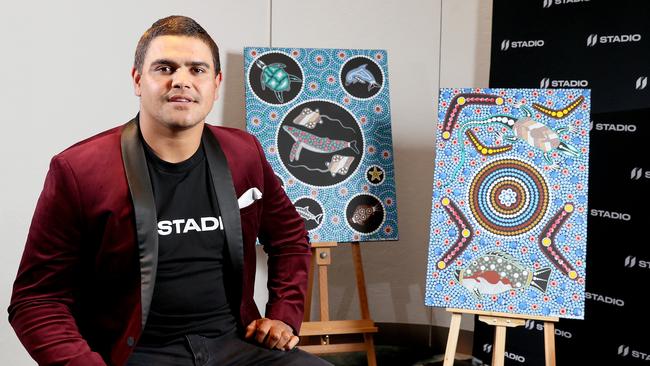 Latrell Mitchell has collaborated with his uncle Maurice Goolagong to produce some Indigenous art to sell as a Non-Fungible Token (NFT). Picture: Toby Zerna