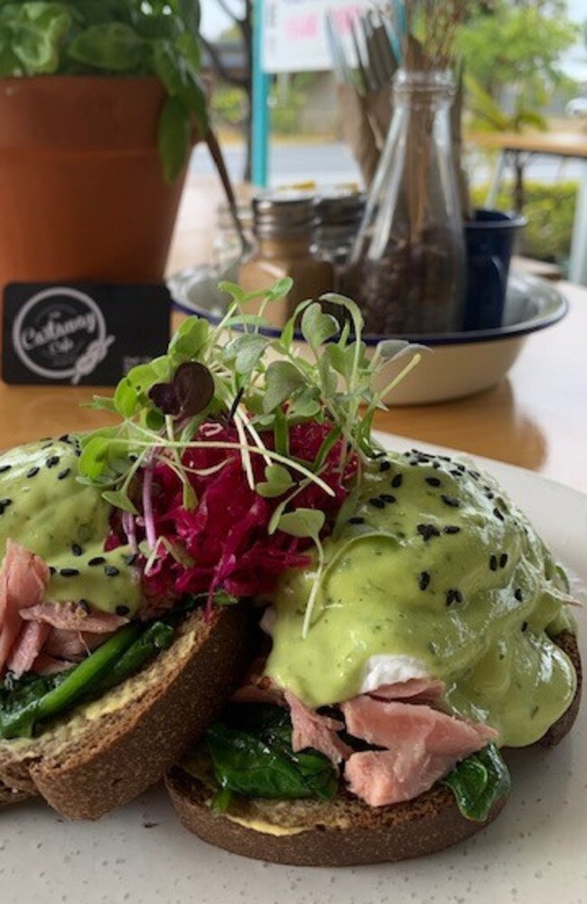 Jacobs Well Castaway Cafe - green eggs and ham breakfast with free range eggs, rye bread, wilted spinach, poached ham hock, avocado sauce, sauerkraut.