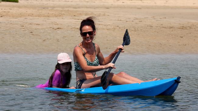 Bushfire recovery on NSW Far south coast. Irish tourists Deirdre Dunne and daughter Bree Odgers enjoy a kayak at North Broulee Beach near Batemans Bay. Picture: Toby Zerna