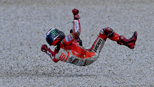 Jorge Lorenzo crashes out on turn 8.