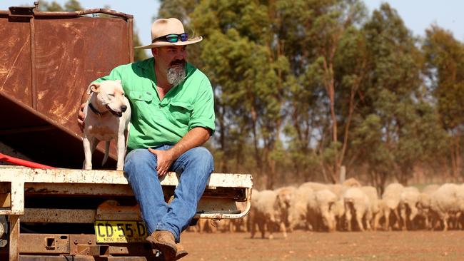 Phil Clark received a tanker of water for his farm just outside of Tomingley in central west NSW. Picture: Toby Zerna