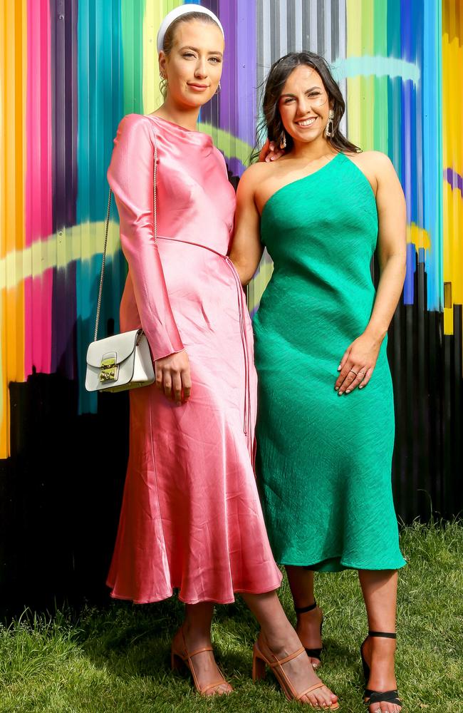 Katie Williams (left) and Michelle Petrulis have opted for bold jewel tones. Picture: Tim Carrafa