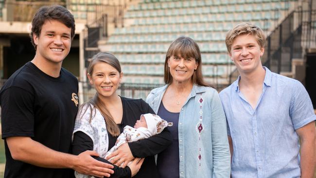 Chandler, Bindi, Terri and Robert looking at baby Grace. Picture: Supplied