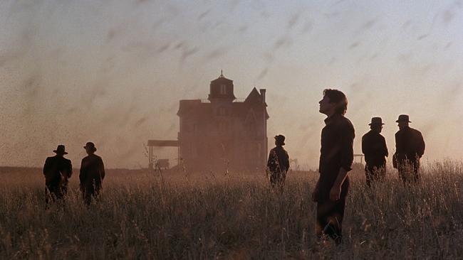 Richard Gere, foreground, in Terrence Malick’s 1978 film <i>Days of Heaven</i>.