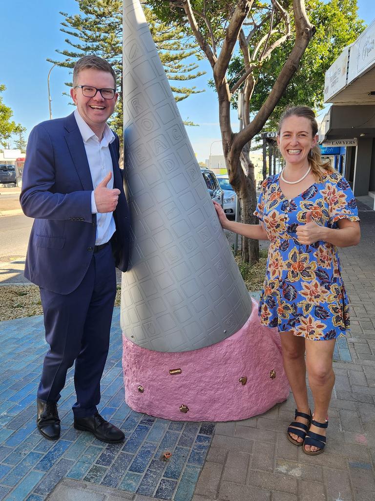 Chris Picton MP and Councillor Gretel Wilkes with the new ice cream artwork ‘Oops’ on Beach Rd at Christies Beach. Picture: Facebook