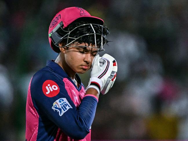 TOPSHOT - Rajasthan Royals' Vaibhav Suryavanshi reacts as he walks back to the pavilion after his dismissal during the Indian Premier League (IPL) Twenty20 cricket match between Rajasthan Royals and Lucknow Super Giants at the Sawai Mansingh Stadium in Jaipur on April 19, 2025. (Photo by Money SHARMA / AFP) / -- IMAGE RESTRICTED TO EDITORIAL USE - STRICTLY NO COMMERCIAL USE --