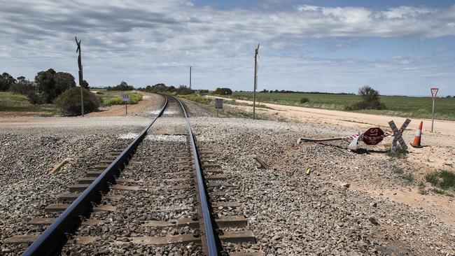 Train crossing at the intersection of Calomba Road, Calomba. AAP/MIKE BURTON