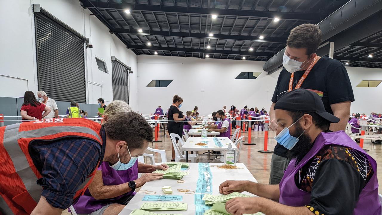 Australian Electoral Commission staff sort through votes. Picture: AEC