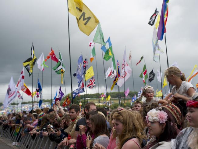 A rainy morning had turned large parts of the festival to mud by Sunday morning. Picture: Oli Scarff