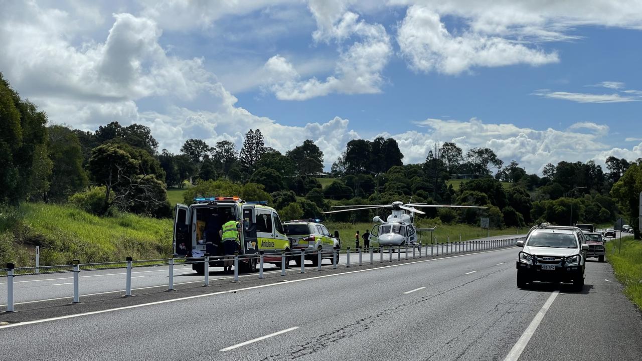 The chopper lands on the Bruce Highway south of Gympie to airlift a seriously injured motorbike rider on November 28.