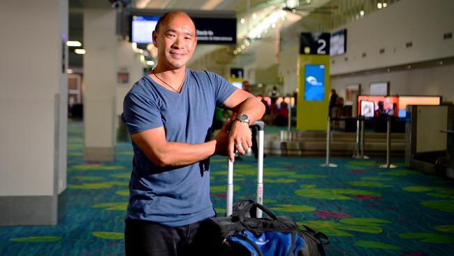                         <s1>Collin Leung, of Woolner, at Darwin Airport, believes something should be done to alleviate the costs of flying in and out of Darwin</s1>. Picture: Justin Kennedy