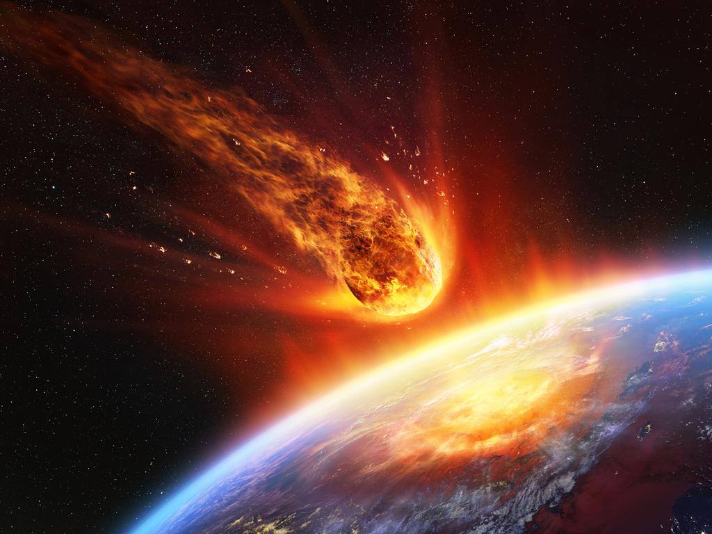 An artist’s impression of an asteroid hitting the Earth. Picture: NASA Goddard Space Flight Center, Reto Stöckli