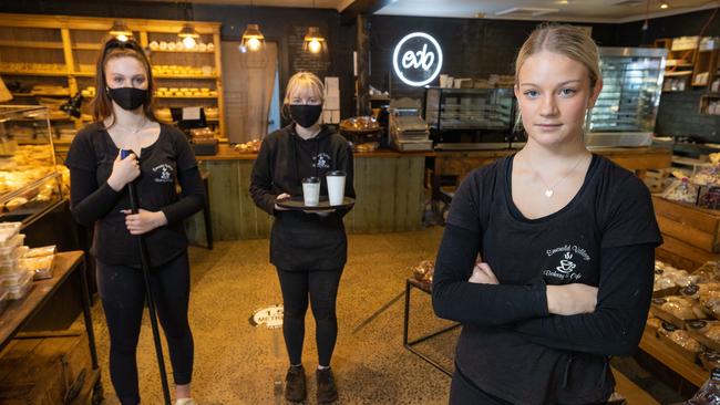 Emerald Village Bakery and Cafe owner Nat Granieri is worried for employees like Maddison Mayberry, Jessica Deed, and Erin Ardley. Picture: Jason Edwards