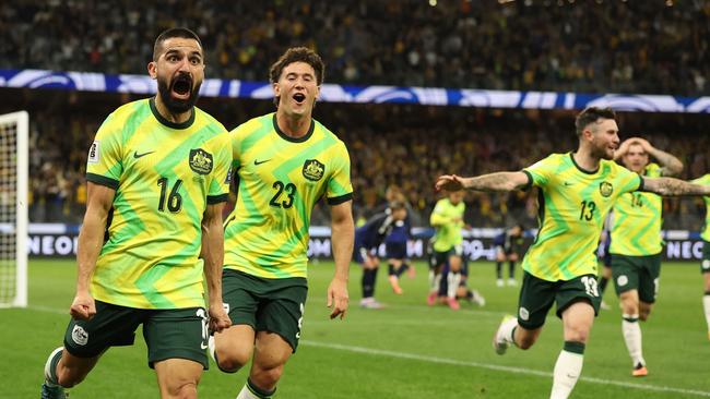 PERTH, AUSTRALIA - JUNE 05: Aziz Behich of the Socceroos celebrates scoring a goal during the 2026 FIFA World Cup Round Three AFC Asian Qualifier match between Australia Socceroos and Japan at Optus Stadium on June 05, 2025 in Perth, Australia. (Photo by Robert Cianflone/Getty Images)