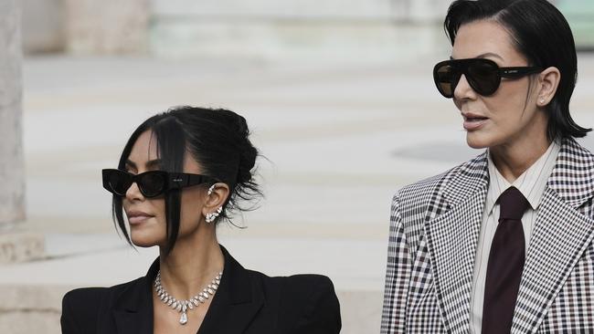 Kim Kardashian with Kris Jenner leaves the justice palace after testifying. Picture: AP Photo/Aurelien Morissard
