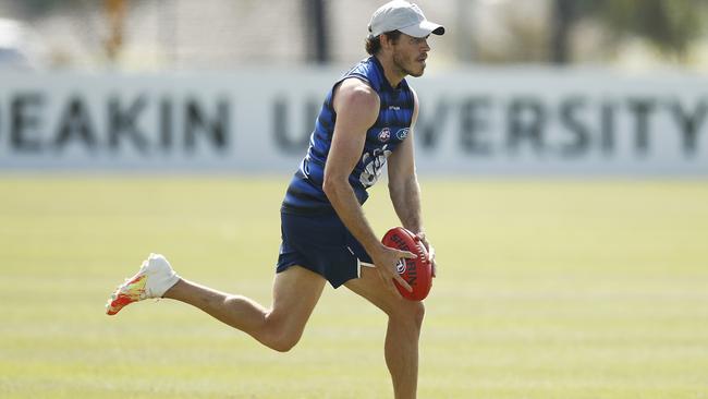 Isaac Smith in action during a Geelong training session.