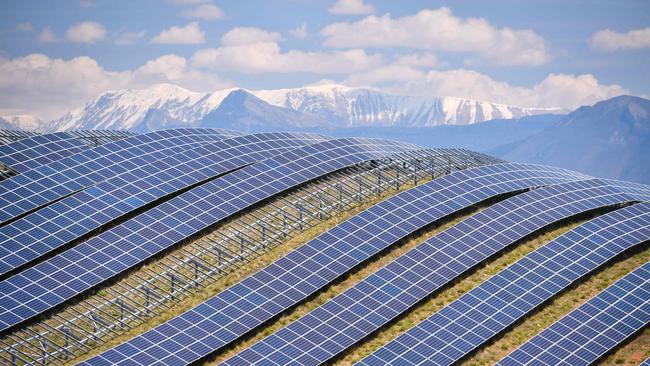 A general view shows the photovoltaic solar pannels at the power plant in La Colle des Mees, Alpes de Haute Provence, southeastern France, on April 17, 2019. - The 112,000 solar panels cover an area of 200 hectares with a total capacity of 100MW. (Photo by GERARD JULIEN / AFP)