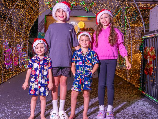 Braxton Burrough, Kingsley Mansour, Joey Tangos and Elle Tanios show their Christmas spirit at the Moorebank home. Picture: Thomas Lisson