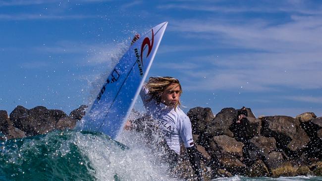 Snapper Rocks Junior heat winner Josh Boyle smashing the lip! Photo: Adrian Bort/Adrenaline shots