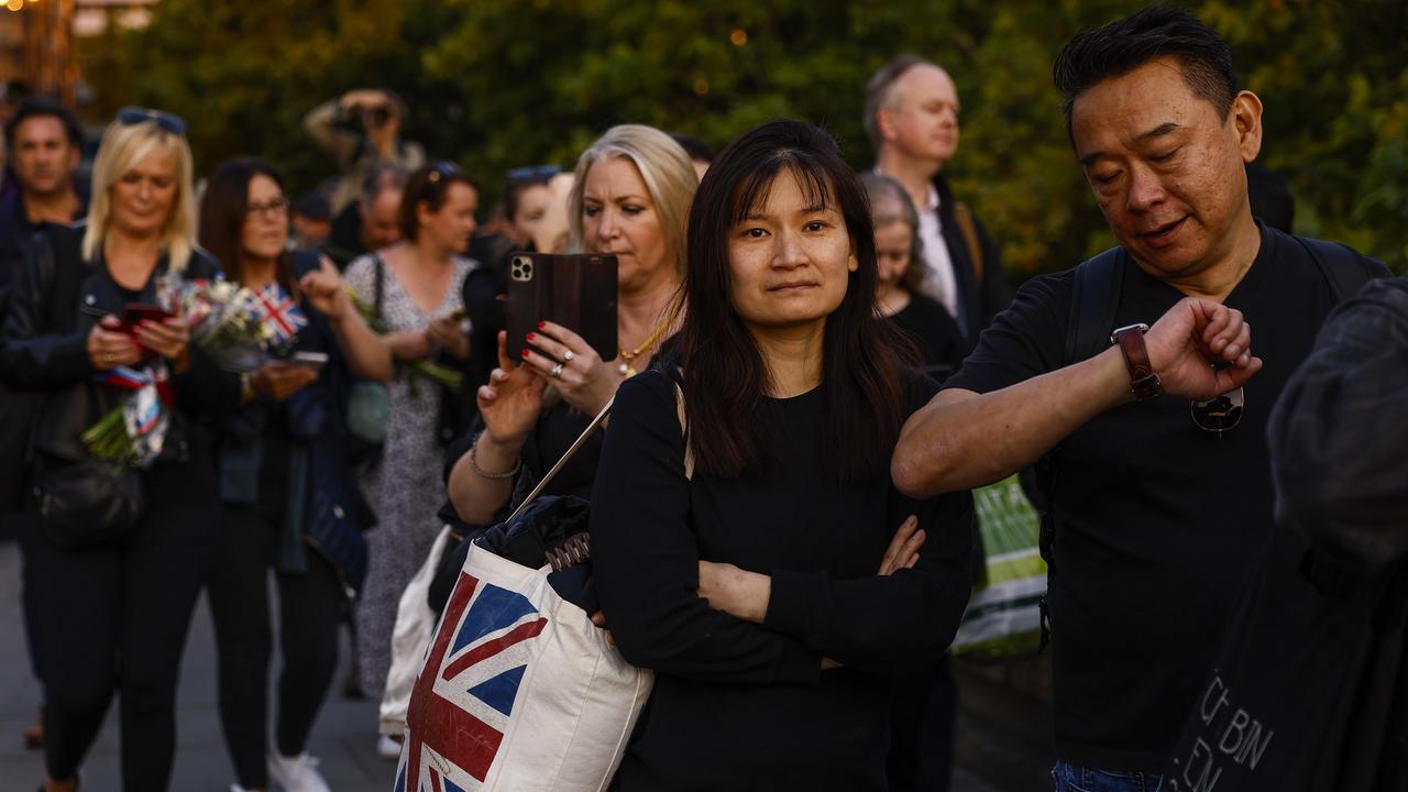 Members of the public stand in the queue on September 14 to pay their last respects to Queen Elizabeth II. Picture: Jeff J Mitchell/Getty Images