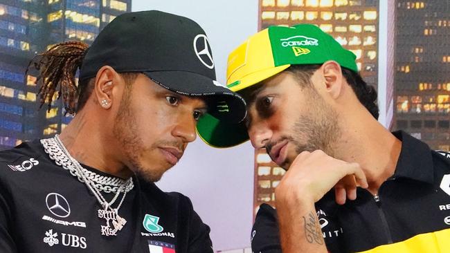 Daniel Ricciardo (R) and Lewis Hamilton address the media before the 2020 Melbourne GP was cancelled. Picture: AAP/Scott Barbour