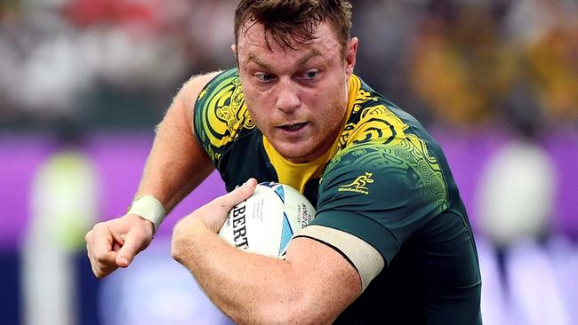 Australia's Jack Dempsey runs with the ball during the Japan 2019 Rugby World Cup Pool D match between Australia and Uruguay at the Oita Stadium in Oita on October 5, 2019. (Photo by GABRIEL BOUYS / AFP)