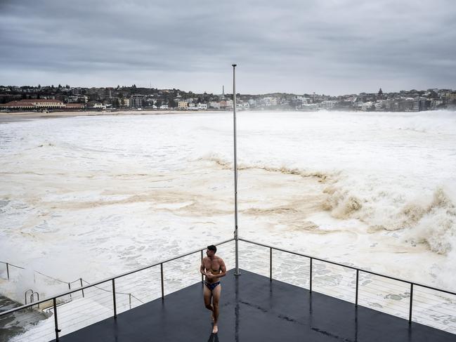 Saturday 2nd April 2022Bondi BeachNo Sun as yet.White water wash at Bondi baths keep even the hardest swimmers away.PictureÃs Darren Leigh Roberts