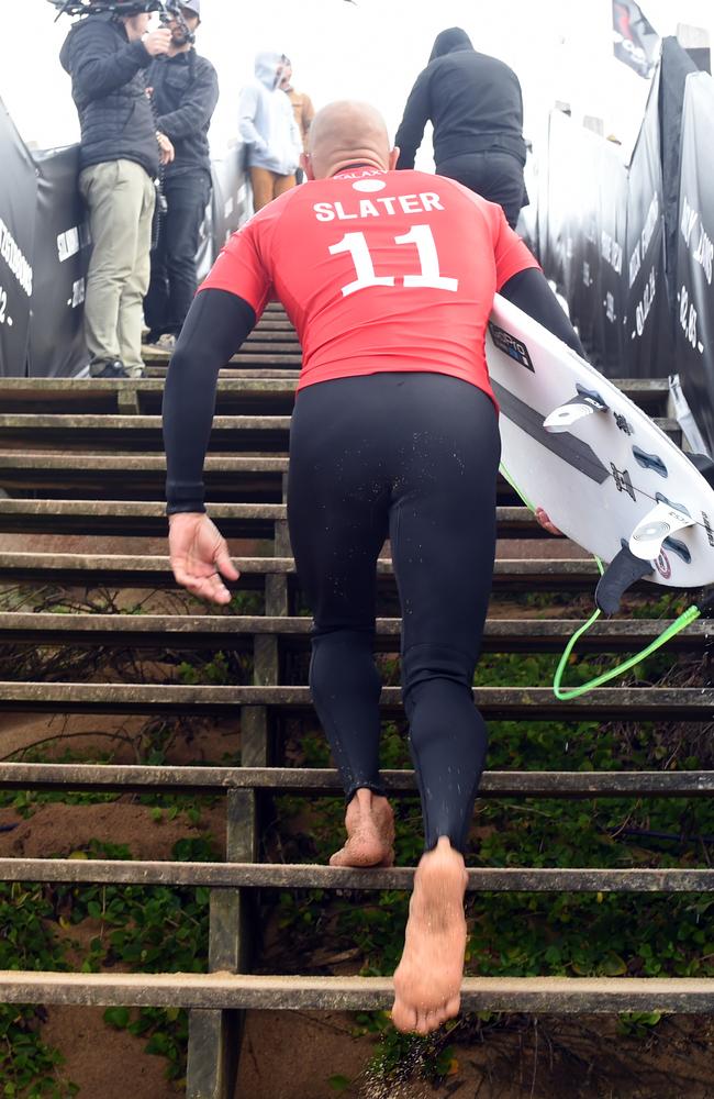 Kelly Slater climbs the infamous stairs at Bells Beach.